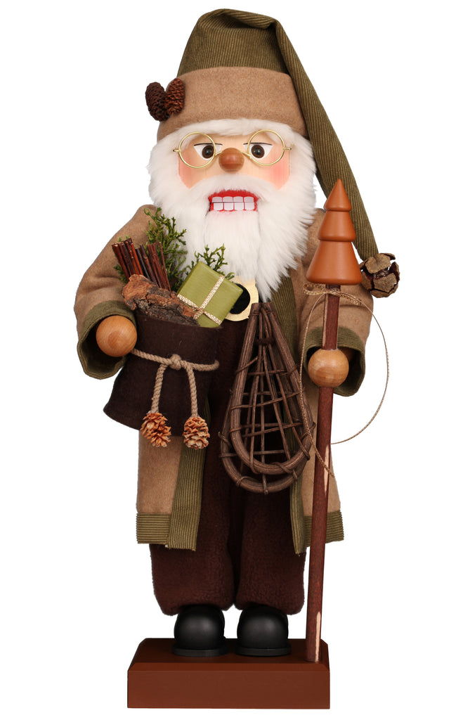 The Christian Ulbricht Collectible Wooden Nutcracker - Forest Santa Limited Edition 2500 features a bearded woodsman in glasses with a brown coat and hat, holding festive gifts, all handcrafted in Germany on a rectangular base.