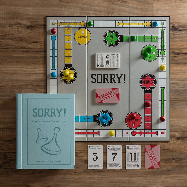 The Sorry! Vintage Bookshelf Edition features colorful pieces, cards, and comes in a light blue box—perfect for collectors and fans of the classic game.