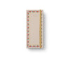 The Delphine Sticky Note Folio is a rectangular tear-off pad with a light cover, gold "NOTES" text, gold elastic band, and a colorful border inspired by the Delphine pattern with small red, green, and blue floral accents.