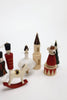 Sabo Concept Christmas Ornaments: a hand-painted wooden set featuring a ballerina, toy soldier, castle, mouse king, rocking horse, and tree—beautifully arranged on a white background.