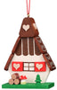 Christian Ulbricht Ornament - Gingerbread House made in Germany, featuring red heart shutters, a mushroom, a stack of logs, and a small green tree on a green base. Warning: contains small parts.