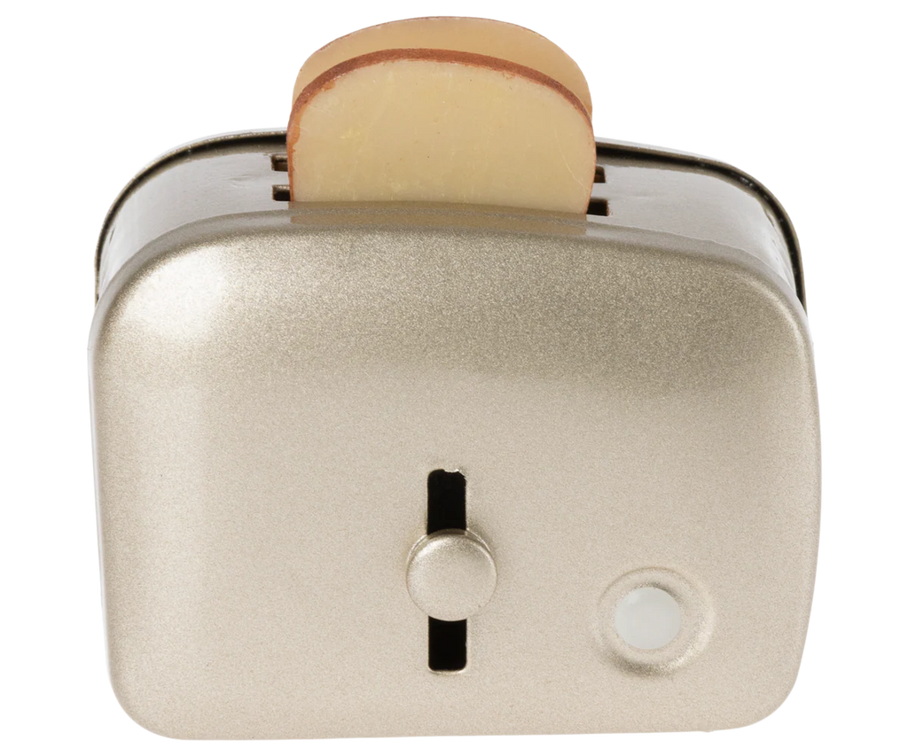 The Maileg Toaster with Bread, Large Size - Silver, is a toy toaster for children 3+, featuring a silver finish and a plastic bread slice popping out of the top, shown from the front against a plain background.