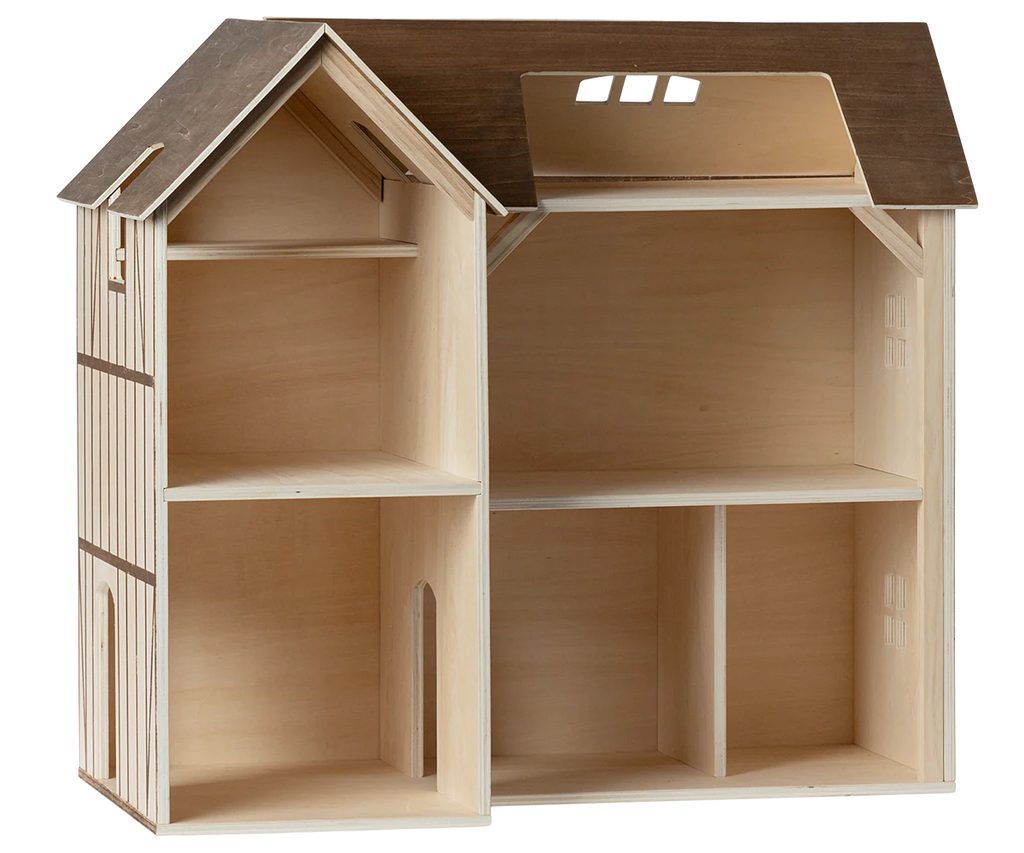 A Maileg Farmhouse Dollhouse with Wallpaper featuring multiple rooms and a dark roof.