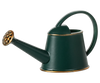 The Maileg Watering Can, Mouse - Dark Green features a large handle, wide open top, and gold-colored spout and rim—perfect for nurturing your plants or flowers.
