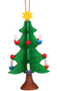 The Christian Ulbricht Ornament - Christmas Tree showcases a hand-painted wooden tree adorned with green branches, vivid red and blue candle holders, white candles, and topped with a bright yellow star, all gracefully hung by a red string.