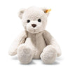 The Steiff Robby Teddy Bear 17" is a soft, light beige plush toy with dark eyes, a brown nose, and a yellow ear tag, sitting upright against a white background—perfect for winter cuddles.