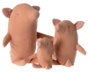 The Maileg Truffle Pig, Medium, is a soft, plush pink doll with small checkered inner ears and minimal features, including tiny eyes and a snout.