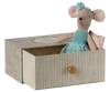 The Maileg Dance Mouse in Daybed, Little Sister - Mint, features a small sister mouse in a mint dress and headband sitting inside a patterned daybed box with a pull-out drawer, holding a tiny mint-patterned pillow.