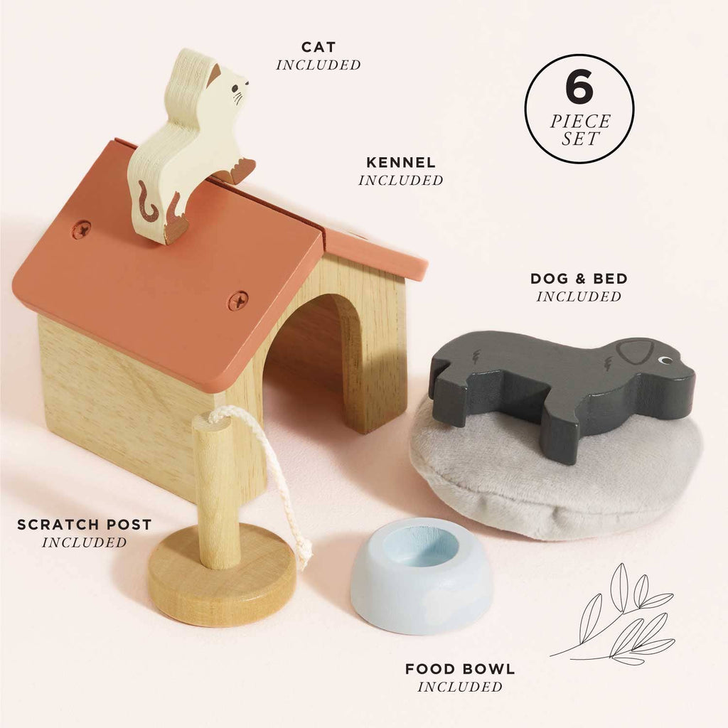 The Dolls House Pet Set includes a small wooden kennel, cat figure on the roof, scratch post, food bowl, and a dog on a gray cushion. Each labeled piece is part of this 6-piece set for imaginative play.