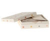 A rectangular white gift box with multicolored polka dots, partially open to reveal tissue paper, a card, and a glimpse of the Maileg Lullaby Friends Mobile with its charming printed fabrics.
