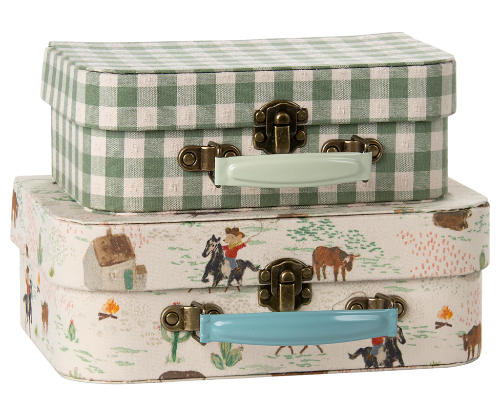 The Maileg Suitcase Set, 2-Pieces - Pony, features small, stackable suitcases with a green and white gingham case on top and a vintage pony scene below. Both have brass clasps and colorful handles for charming storage.