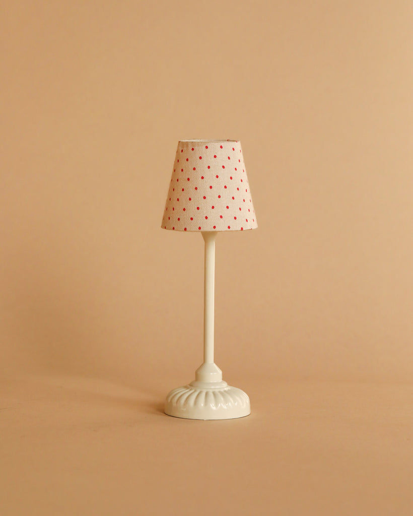 Miniature Maileg Christmas Room Set table lamp with a cream base and a cream shade featuring small red dots.