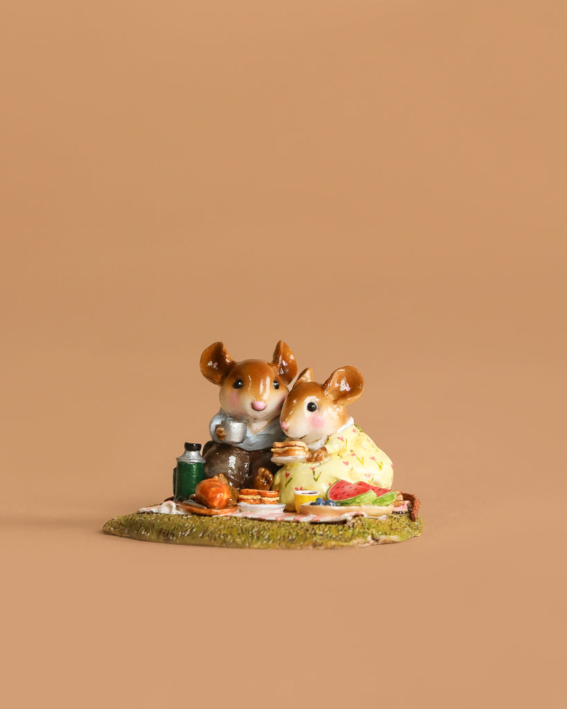 The Wee Forest Folk Tiny Collectible - Just the Two of Us (Not a Toy) features two handmade mouse figurines in charming outfits enjoying a picnic on a blanket with food and drinks, set against a simple light brown background.