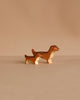 The Handmade Holzwald Dachshund Dog, Small, is a charming sustainable wooden toy that adds warmth to any space—perfect for display or play.