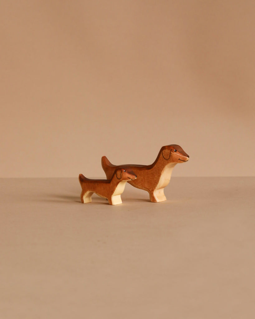 The Handmade Holzwald Dachshund Dog, Small, is a charming sustainable wooden toy that adds warmth to any space—perfect for display or play.