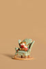 The Wee Forest Folk Tiny Collectible - Sharing A Story features a hand-sculpted mouse reading with a teddy bear in a green armchair, set against a plain beige background.
