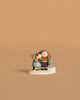 The Wee Forest Folk Tiny Collectible - The Little Wanderers features two mice in winter clothes on a snowy patch—one holding a lantern, the other snuggling close—set against a plain beige background.