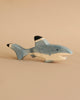 Handcrafted Holztiger Handmade Wooden Ocean Animals Set shark toy painted in shades of blue and white with black fin tips.