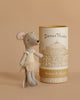 A small Maileg Royal Ballet Set mouse in a cream ballerina outfit and headband stands beside a cylindrical "Dance Theater: Romeo & Juliet" box with a theater drawing, set against a light beige background.