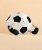 Plush toy shaped like a large soccer ball with a smiling face, striped arms, and black feet, set against a plain beige background—meet the playful Mon Ami Soccer Ball Set.