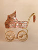 Konges Sloejd Mini Doll Pram - Sparkly Cherry Sequin with a sequined carriage featuring a cherry pattern, set on a beige frame with four large wheels.