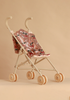 Konges Sloejd Sparkly Doll Stroller - Cherry Sequin with double wheels, a light beige frame, and a seat made of washable fabric covered in pink sequins with a cherry pattern.