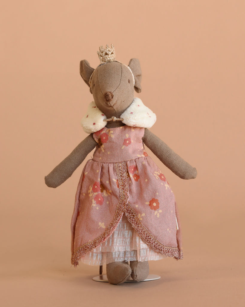 The Maileg Mum Mouse in Queen Dress with Stand features a plush mouse wearing a gold crown, floral pink queen gown with lace trim, and white fur collar—perfect for any mouse house or collection of mouse accessories.