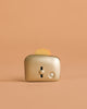 The Maileg Toaster with Bread, Large Size - Silver features a metallic finish and includes toy bread—perfect for any children's kitchen set.