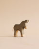 A small, handmade wooden donkey figurine from the Handmade Holzwald Farm Animals Set.