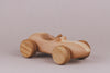 Introducing the Handmade Wooden Race Car: crafted from beech wood, featuring ultra-smooth wheels and a natural linseed oil finish.