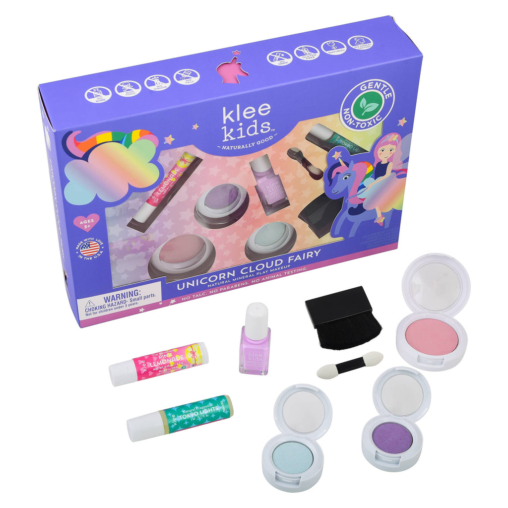 Klee Naturals Deluxe Makeup Kit - Unicorn Cloud Fairy featuring two lip balms, a bottle of nail polish, three compacts with colorful powder, an applicator, and a brush, displayed in front of its purple unicorn-themed packaging.