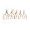 Five cream-colored Organic Baby Hat – Schooner hats with knotted tops are lined up side by side, each with a small tag and delicate floral or sprout patterns—ideal as organic newborn essentials.