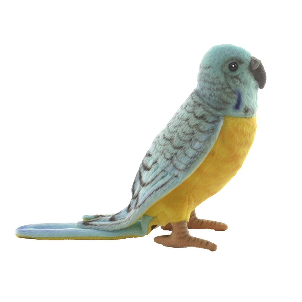 The Parakeet Bird Stuffed Animal is a hand-sewn plush toy with blue and yellow feathers, gray patterned wings, a dark beak, and brown feet, shown standing upright against a white background.