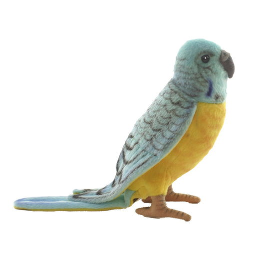 The Parakeet Bird Stuffed Animal is a hand-sewn plush toy with blue and yellow feathers, gray patterned wings, a dark beak, and brown feet, shown standing upright against a white background.