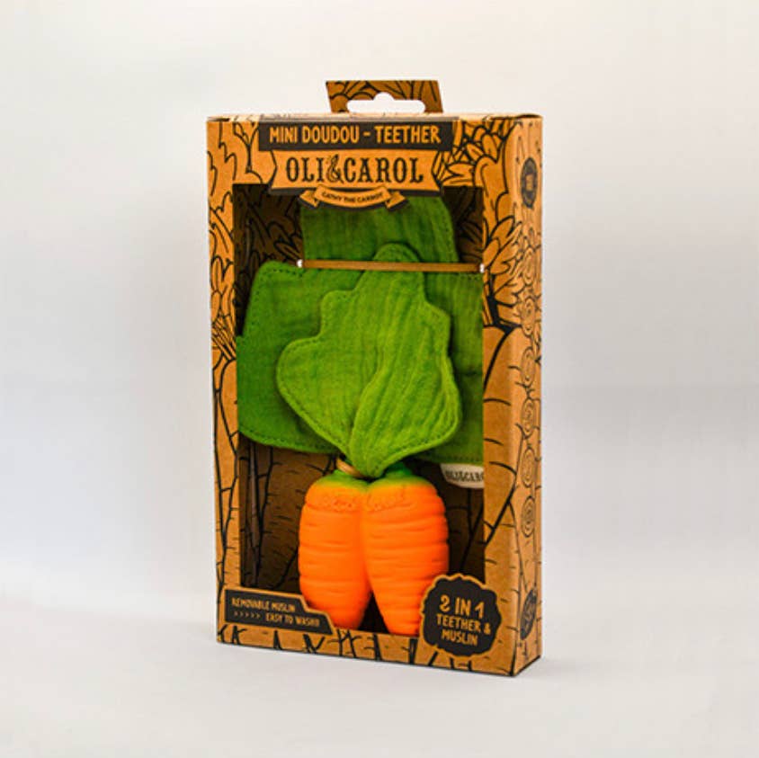 The Cathy the Carrot Mini DouDou Teether is a boxed set featuring a soft carrot-shaped muslin with orange roots and green leaves, designed as a 2-in-1 natural rubber teether and doudou to support babies' sensory development.
