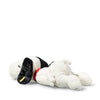 The Steiff XL Snoopy Lying Down 16" plush features Snoopy on his stomach with closed eyes, black floppy ears, a red collar, and a relaxed pose set against a plain white background.