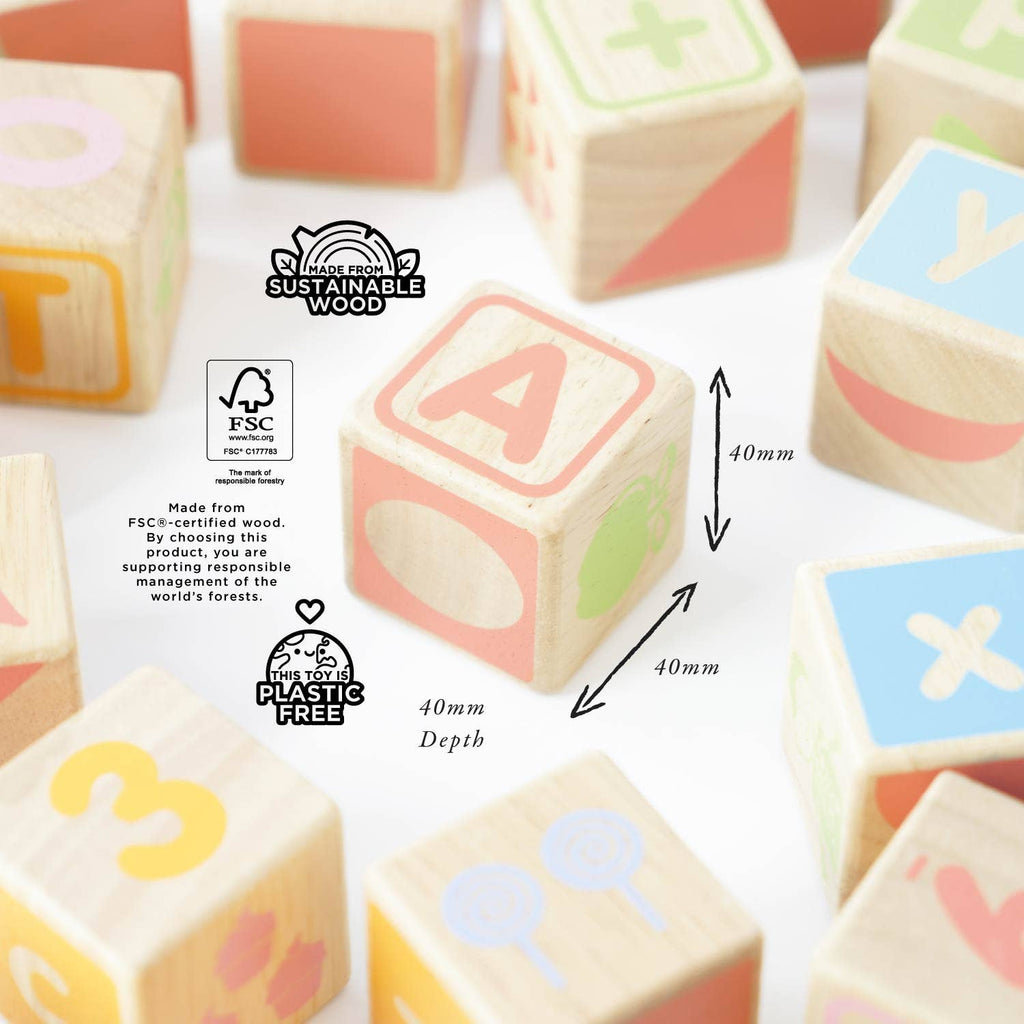 ABC Learning Blocks are pastel wooden blocks designed for toddler education. Made from FSC-certified sustainable wood and plastic free. Each 40mm block features letters, shapes, and symbols. Ships in one week.
