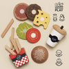 The Gourmet Hamburger Set, made from sustainable wood, includes burger bun pieces, cheese, tomato, lettuce, fries in a red box, and a drink cup. Fun illustrations highlight social and coordination skills. Ships in one week.