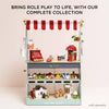 Bring role play to life with our wooden play shop—featuring a red and white striped canopy, toy cash register, grocery shelves, play food items, and the Bakery & Patisserie Wooden Market Crate.