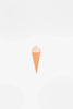 A minimalist image of a simple, cone-shaped Handmade Ice Cream Cone, set against a plain white background with soft, blurry gray circles.