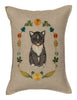 Introducing the Coral & Tusk Kitten Cameo Pillow, a decorative masterpiece showcasing an embroidered black and gray tuxedo cat with a red collar, framed by an oval floral wreath in spring hues on beige fabric—adding elegance to any space. Ships in one week.