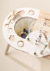 A modern Wooden Activity Table for children featuring various educational toys and games, including shape sorters, beads on wires, and movable parts.