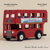 The London Wooden Bus is a handcrafted red double-decker toy featuring "London," city landmarks, gold details, and “Hand Made with Love” on the side—an ideal early learning gift.