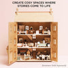 The Grand Natural Wood Doll House features three floors of sustainable wood and includes miniature furniture. Text above: "Create cosy spaces where imaginative play comes to life." Note: Furniture sold separately.