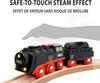 The BRIO World Christmas Steaming Train Set, shown on a curved wooden track, features a safe-to-touch steam effect with a gray hand above and "SAFE-TO-TOUCH STEAM EFFECT" text in English and French.