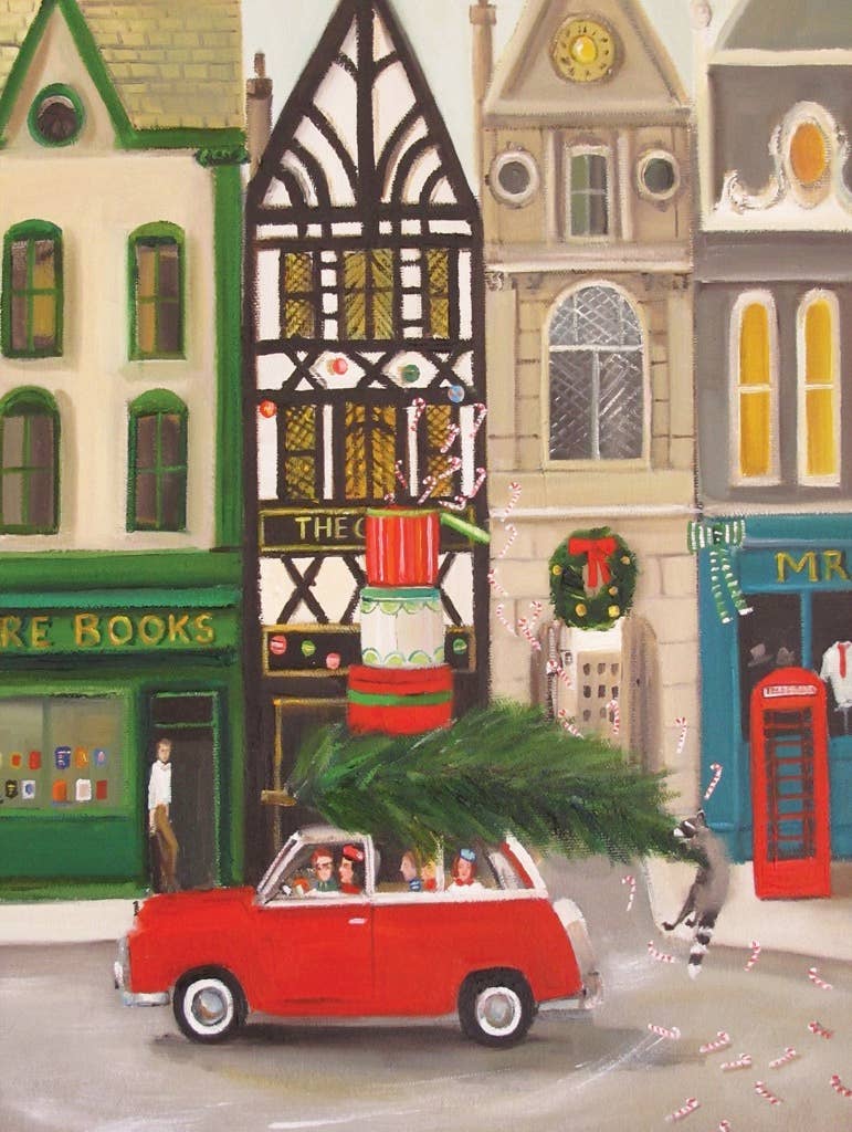 In the Christmas Cheer - 1000 Piece Jigsaw Puzzle, a red car carrying a Christmas tree on its roof drives past a street of shops decorated for the holidays.