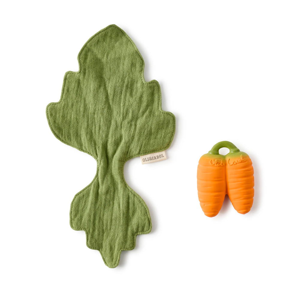 The Cathy the Carrot Mini DouDou Teether features an orange carrot-shaped natural rubber teether with a green handle and a soft, green leaf-shaped doudou—ideal for sensory development.