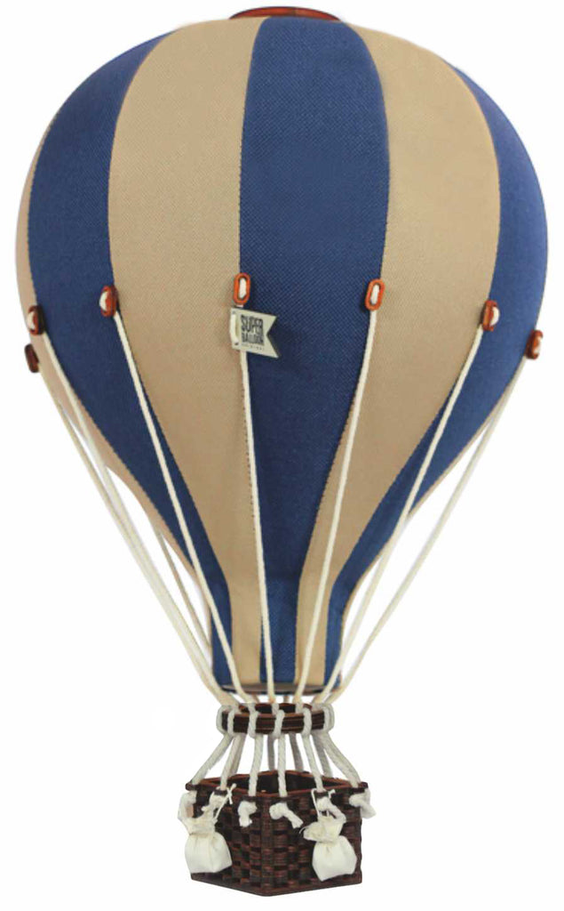 The Hot Air Balloon - Light Brown / Navy Blue features vintage-style alternating blue and beige panels, a woven basket, and white ropes—ideal handmade wooden decor for a child's room.