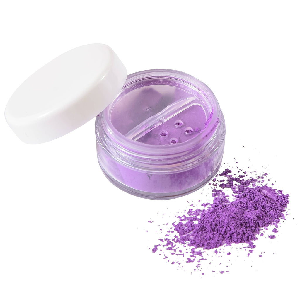 A small clear jar of Klee Naturals Deluxe Makeup Kit - Regal Queen Fairy purple loose powder with the lid off, with a pile of the same play makeup spilled beside it.