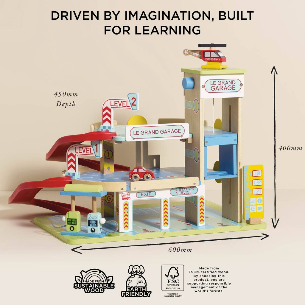 Le Grand Wooden Garage includes ramps, cars, a helicopter, and signs for imaginative play. This eco-friendly toy measures 600mm x 450mm x 400mm and is perfect for creative learning. Icons and text highlight its sustainability at the bottom.